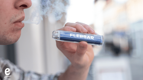 man using flerbar disposable vape 600 puffs